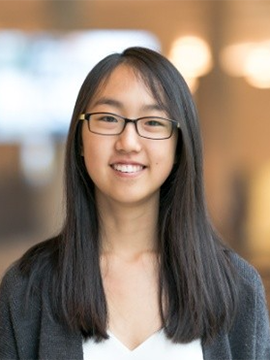 A young Asian woman with shoulder length hair and glasses