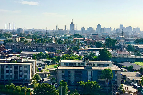 Lagos, Nigeria - a city landscape with a mixture of buildings and greenery